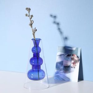 Florero de vidrio transparente y azul 20cm