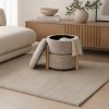 Ottoman de almacenamiento Eli de tela beige