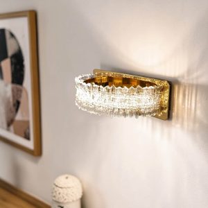 Aplique LED de pared Zule de metal dorado