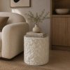 Mesa auxiliar Aeris con acabado travertino blanco Ø40cm
